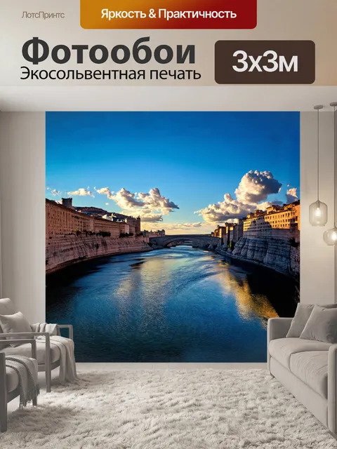 Фотообои величественная река эбро медленно течёт среди величественных серых скал сарагосы, отражая мягкий свет заката